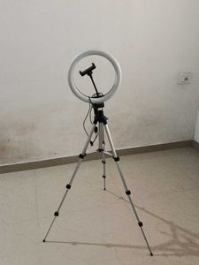 Silver Camera Tripod With Ring Light