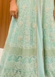Beautiful ethnic gown with skirt and shrug