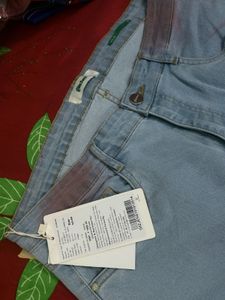 Floral Print Black Fabric and blue jeans