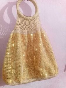Golden Sequence Pottly Beg👝