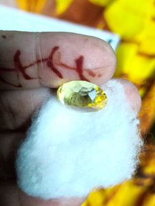 A yellow sapphire, also known as Pukhraj (पुखराज)