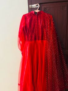 red colour flared dress with shall