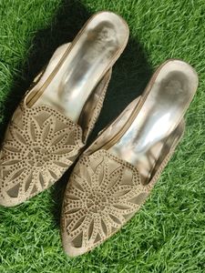 Woman Golden Heels