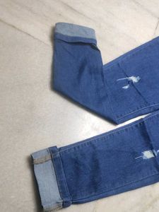 Distressed Blue Denim Jeans