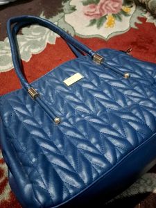 Blue Quilted Handbag of Nelle Harper
