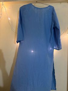 Blue Kurti With Silver Threads On It