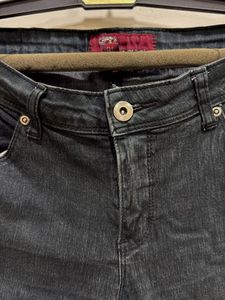 Slight slim fit greenish black jean