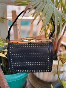 Black embellished sling bag