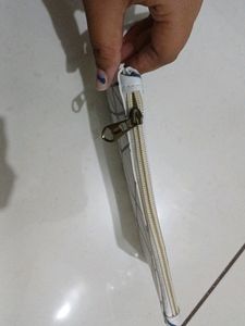 White Purse With Black Stripes And Handle , Length : 19cm , Width: 12 Cm