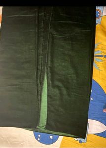 Elegant Dark Green  Saree with  Sleevless Blouse