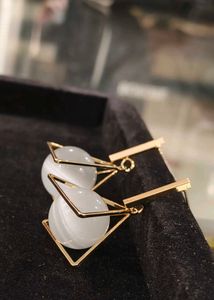 Triangle Drop Gold Toned Earrings