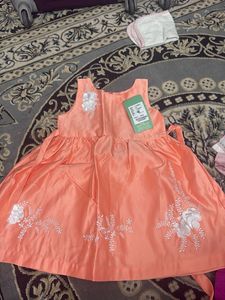 Cute Peach Dress with Floral Detail