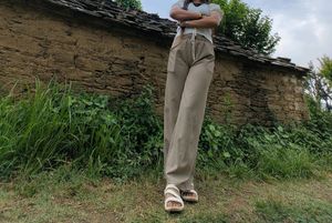 Beige wide leg trousers on sale