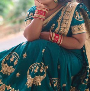 Elegant Teal Embroidered Saree