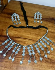 Two Pairs Of Necklace And Earrings
