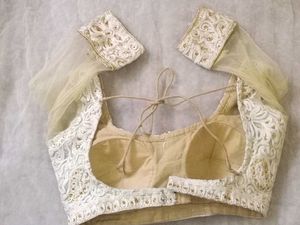 Elegant White Embroidered Blouse