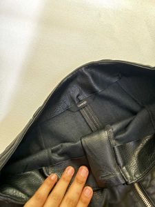 Zip-Up Leather Skirt With WaistBuckle Embelishment