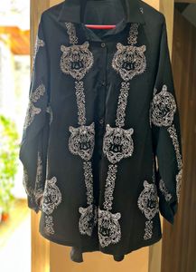 black oversized button-up shirt.