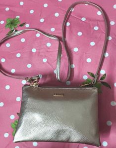 Mochi Metallic Sling Bag