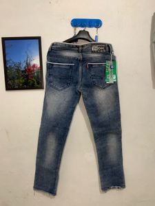 Distressed Denim Jeans