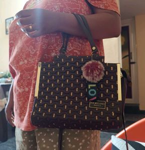 Brown Quilted Handbag with Sequins and Pom-Pom Cha