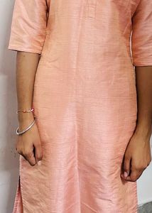 women peach colored linen straight kurta