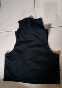 Black Sleeveless Turtleneck Top