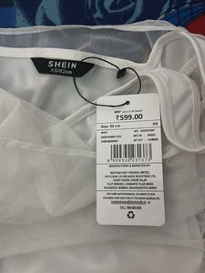 White Sleeveless Top