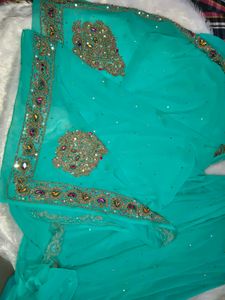 Elegant Teal Embellished Saree