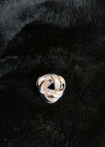 Silver Toned Spiral Curved Earings - 1 Pair