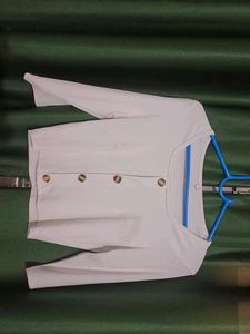 white top ripped straight jeans