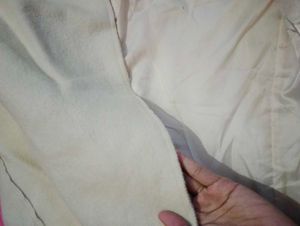 beige colour overcoat