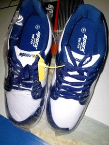 Men Colourblocked Black And White Sneakers.