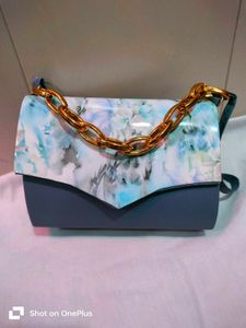 Only Cash Ansari Floral Clutches