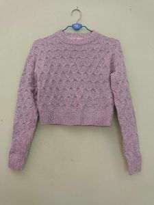 girls woolen sweater of white colour