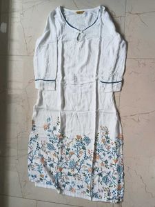 White kurta with beautiful floral work on it