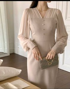 Elegant Beige Midi Dress with Ruffle Hem