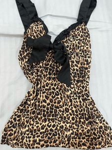 Y2K animal printed top with a cute black bow