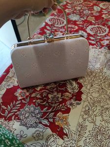 Light Pink Printed Hand Clutch With Sling
