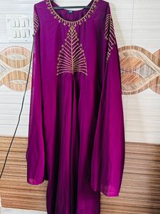 Purple Gown With Long Sleeves