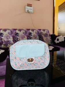 Sky Blue Sling Bags.