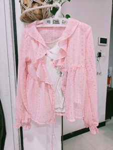 Pink Ruffle Sheer Top and Jeans