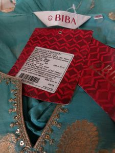 BIBA Womens Notched Neck Gold Woven Kurta with Inn