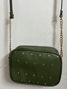 Party Wear Green Sling With Metal Chain Detail