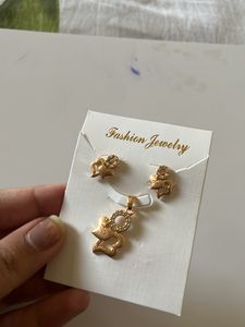 Gold Tone Squirrel Pendant and Earrings