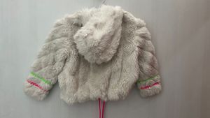 white fur jacket