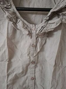 Ruffled Sleeveless Top