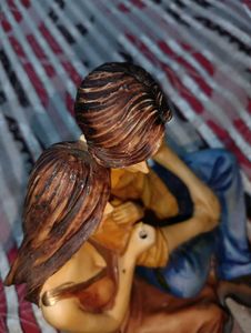 Vintage Couple Under Umbrella Figurine