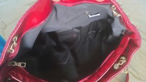 Red Quilted Handbag with Gold Detail