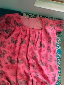 This Is A Top With Floral Print.